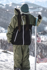 Veste de ski Gsou Snow pour femme, kaki et blanche, avec aération faciale et fermeture éclair asymétrique, imperméable et isolée. 