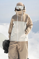 Veste de ski Gsou Snow pour femme, kaki et blanche, avec aération faciale et fermeture éclair asymétrique, imperméable et isolée. 