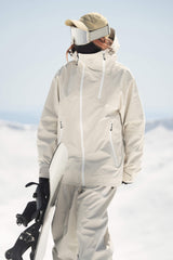 Veste de ski Gsou Snow pour femme, verte et noire, à ventilation faciale asymétrique et fermeture éclair asymétrique, imperméable et isolée. 