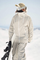 Veste de ski Gsou Snow pour femme, noire et café, avec aération faciale et fermeture éclair asymétrique, imperméable et isolée. 